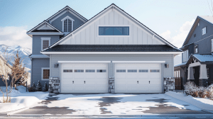 Realistic steel insulated garage doors on a Colorado home with snow-covered driveway
